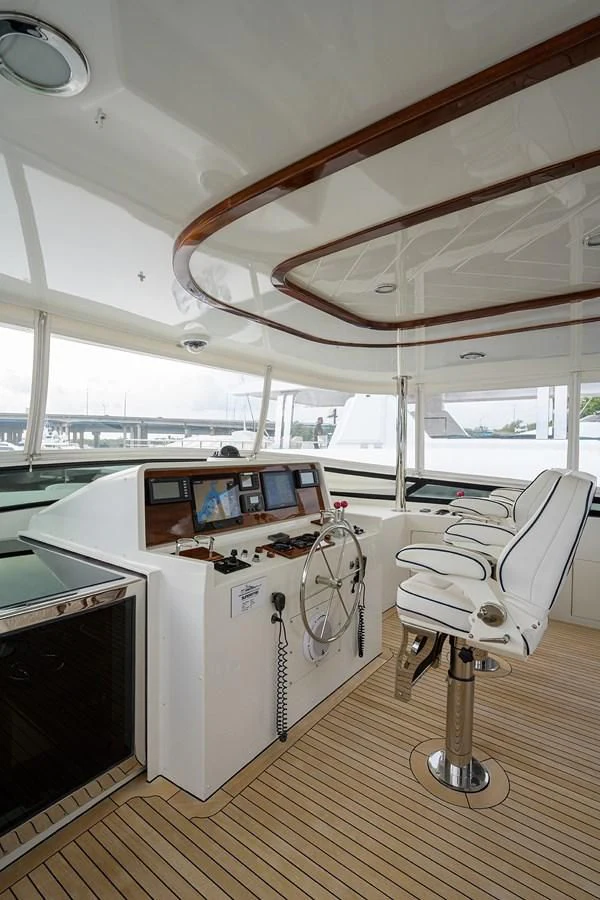 a room with a large white machine and a large window aboard SUPERSTAR Yacht for Charter