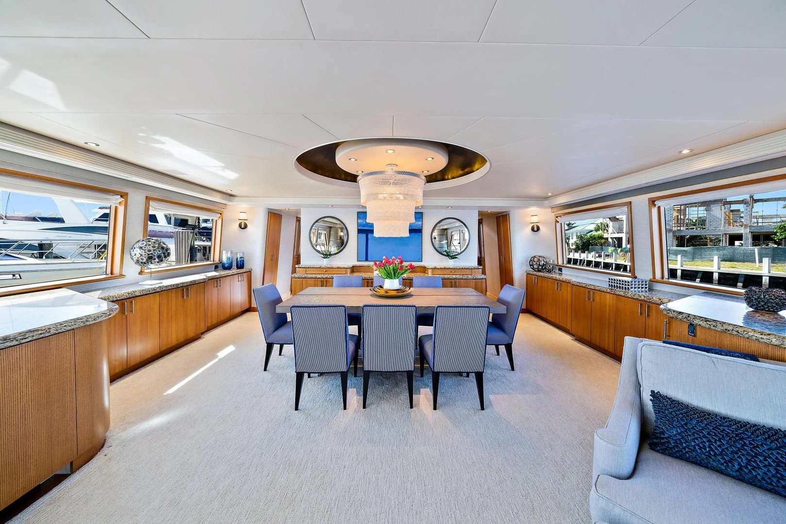 a large kitchen and dining area aboard SUPERSTAR Yacht for Charter