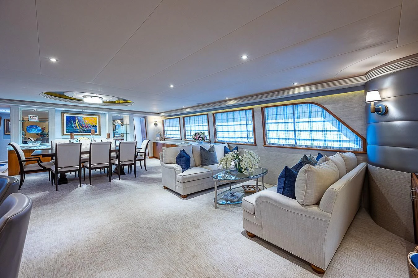 a living room with a couch and a table aboard SUPERSTAR Yacht for Charter