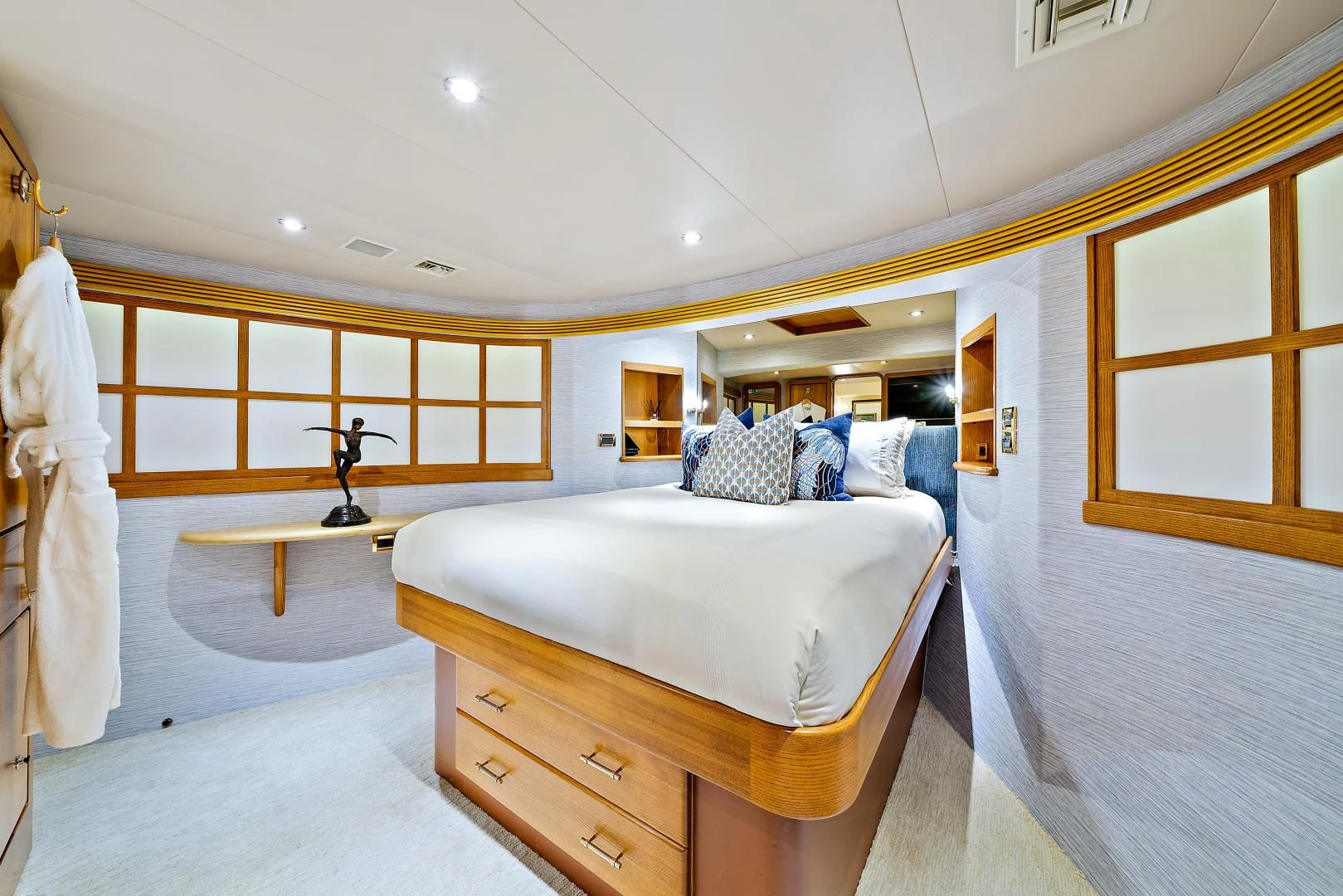a bedroom with a bed and a sink aboard SUPERSTAR Yacht for Charter