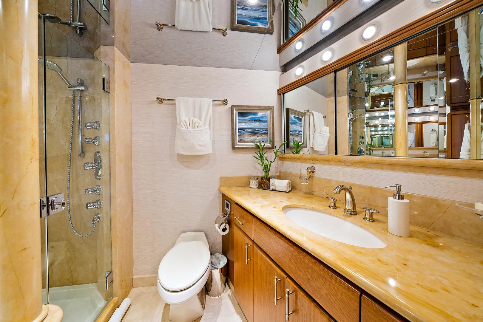 a bathroom with a sink toilet and a shower aboard SUPERSTAR Yacht for Charter