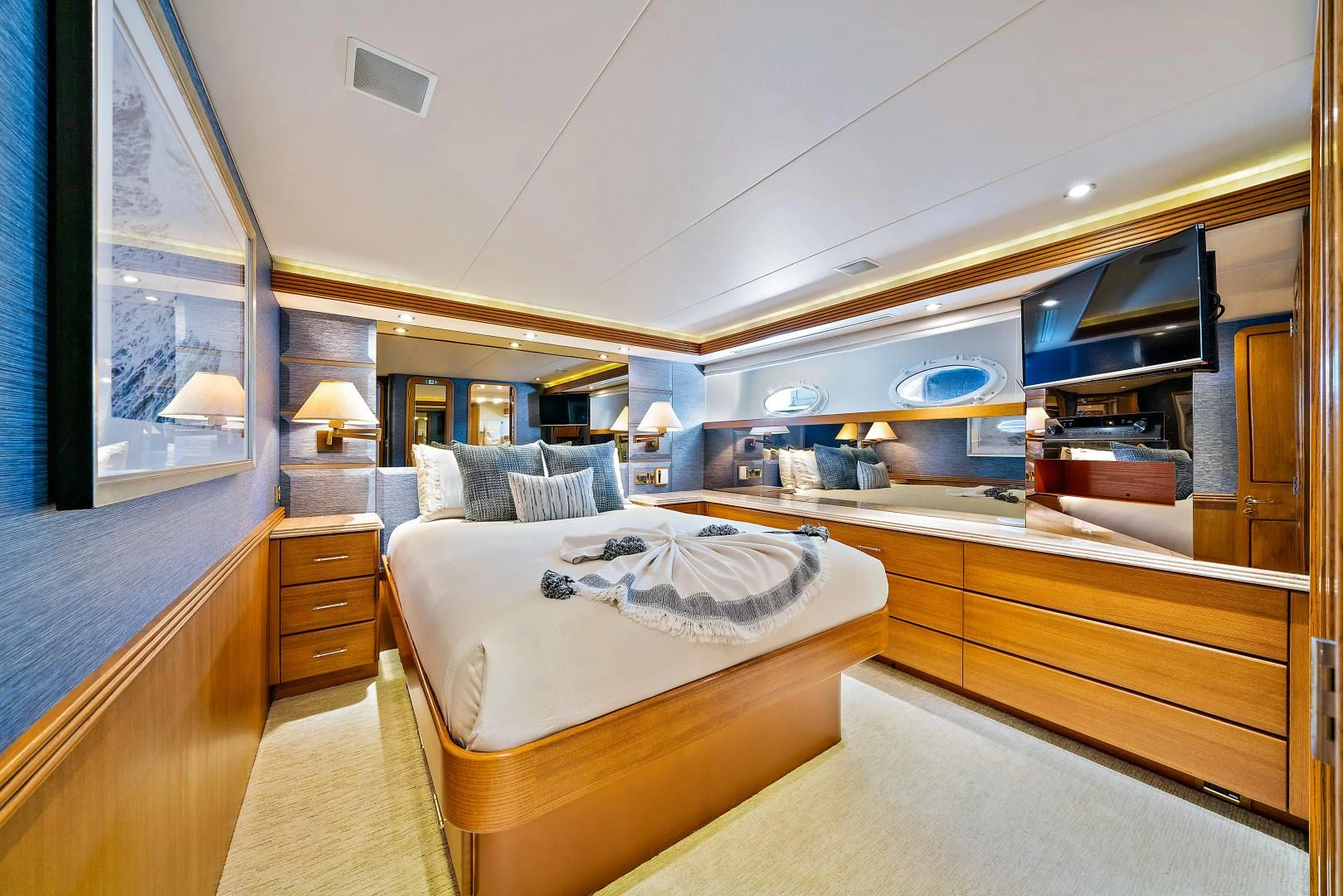 a room with two beds aboard SUPERSTAR Yacht for Charter