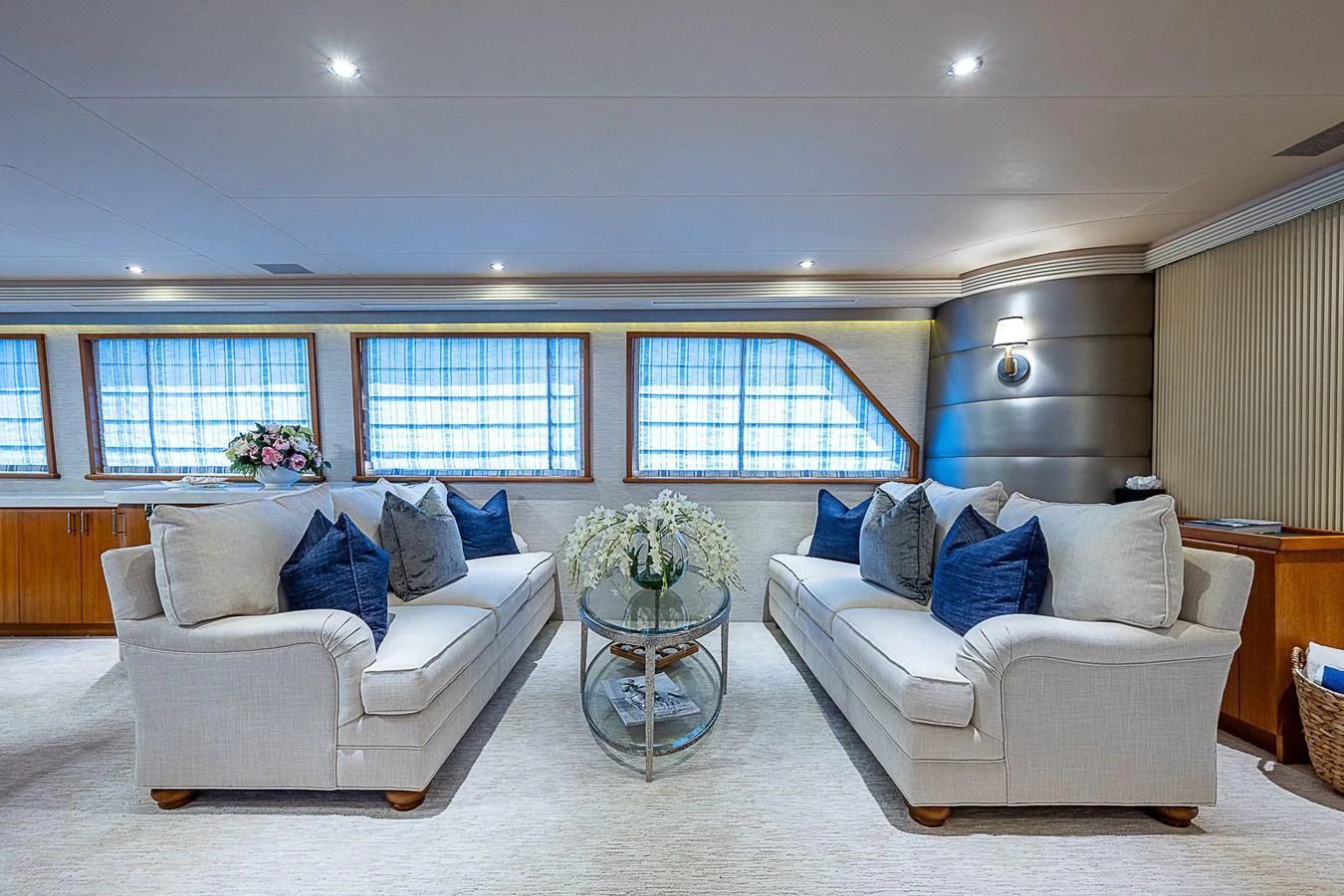 a living room with a white couch and a coffee table aboard SUPERSTAR Yacht for Charter