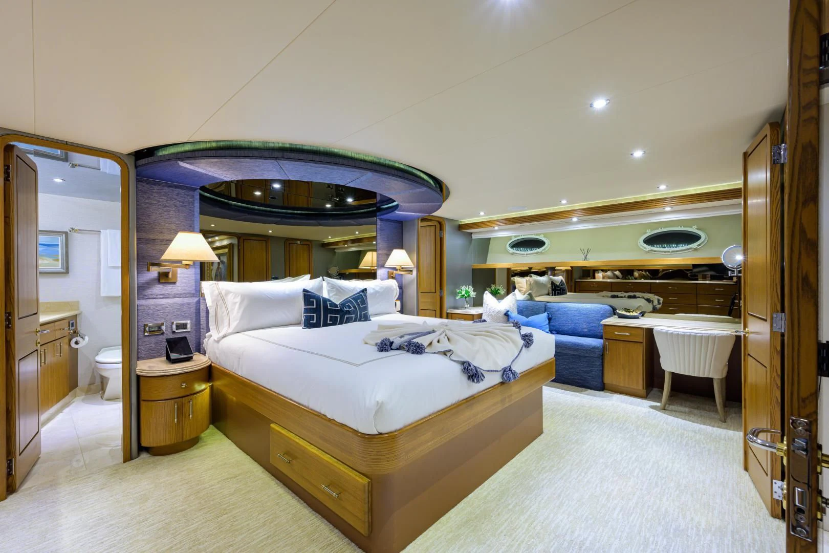 a hotel room with a double bed aboard SUPERSTAR Yacht for Charter