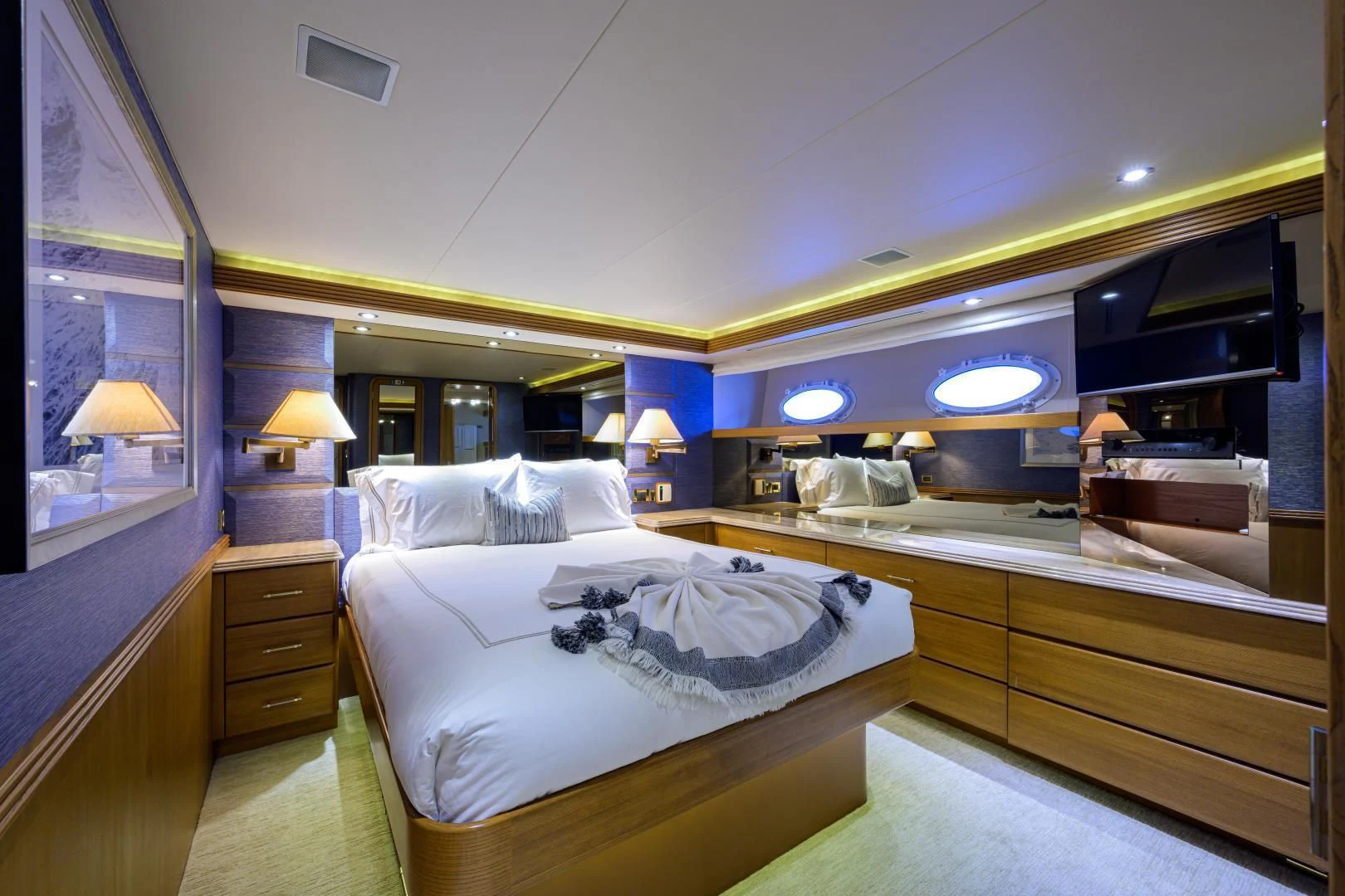 a room with two beds aboard SUPERSTAR Yacht for Charter