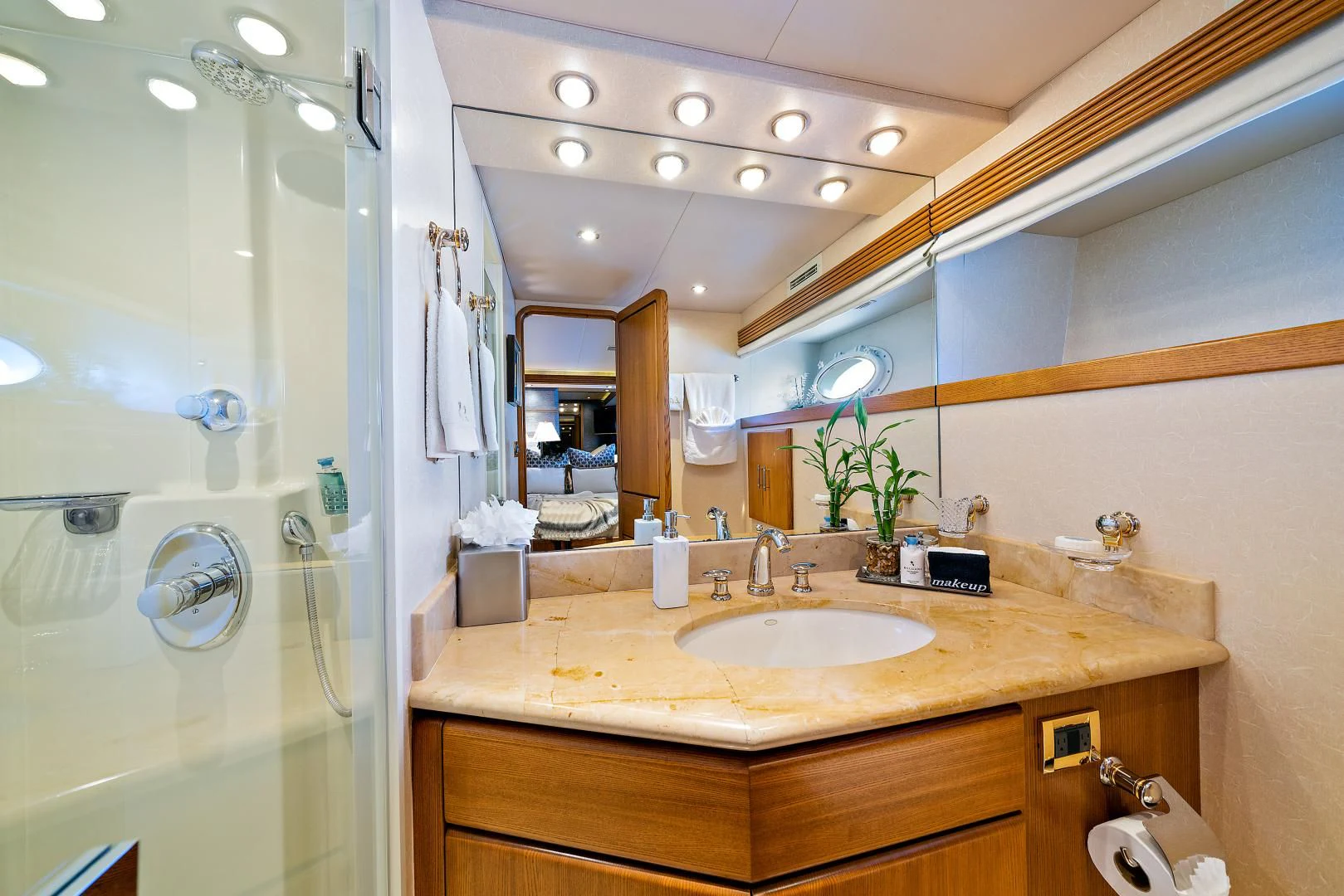 a bathroom with a sink and a mirror aboard SUPERSTAR Yacht for Charter