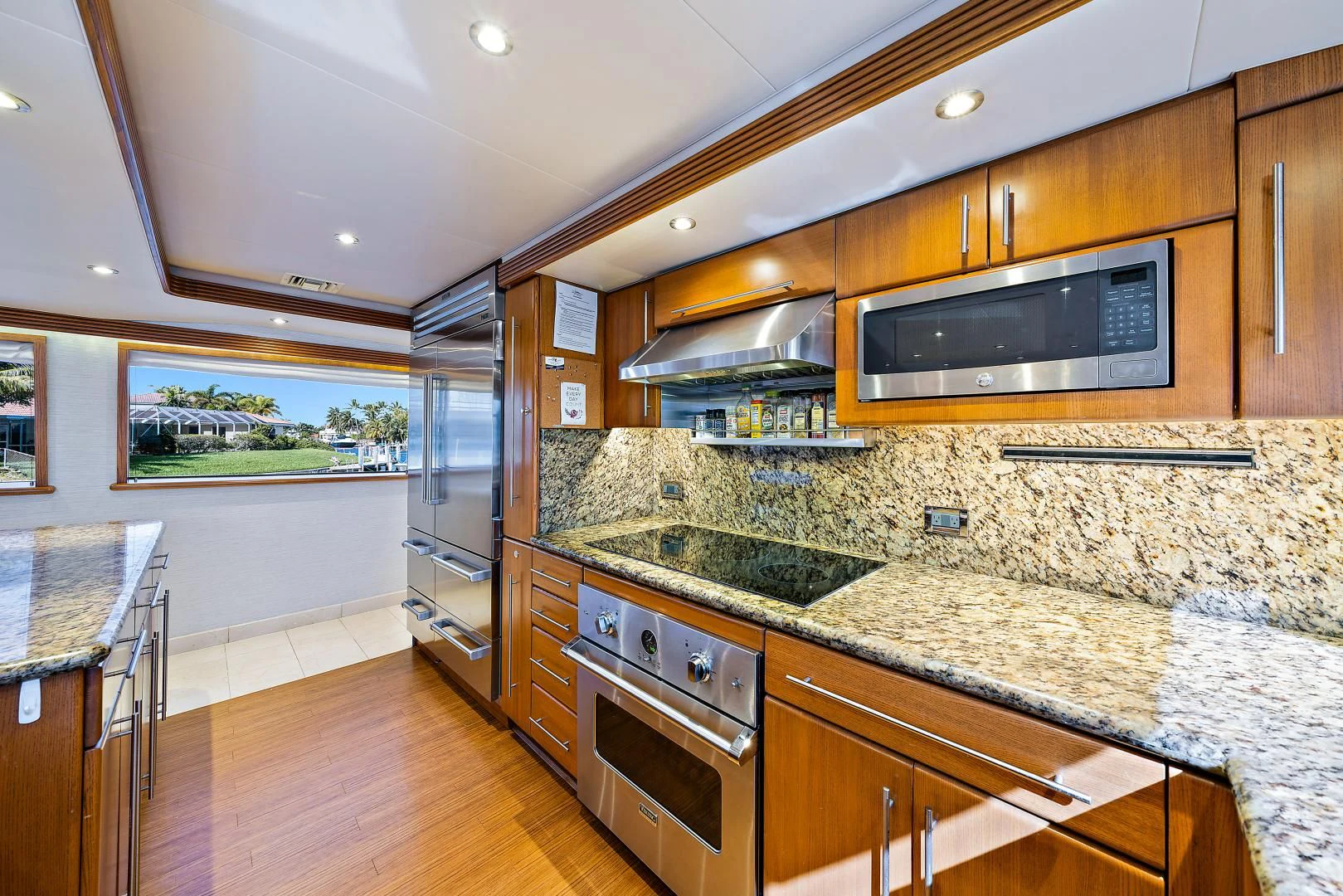 a kitchen with granite counter tops aboard SUPERSTAR Yacht for Charter