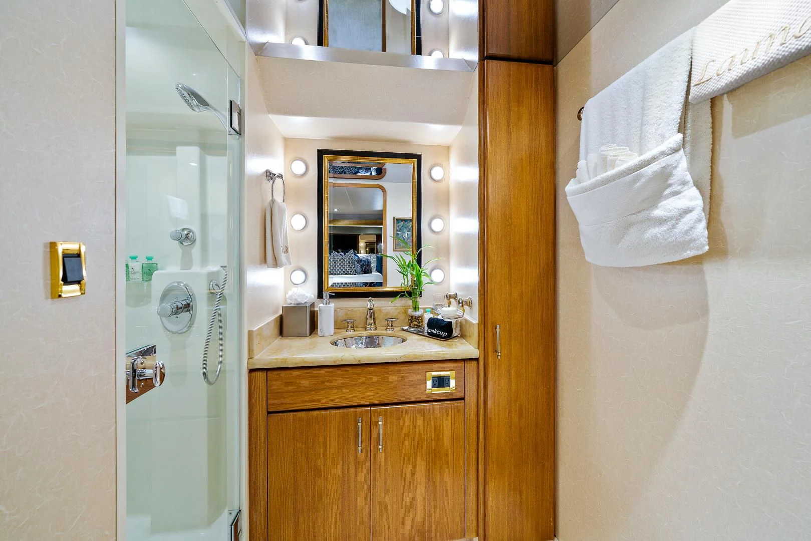 a bathroom with a glass shower door aboard SUPERSTAR Yacht for Charter