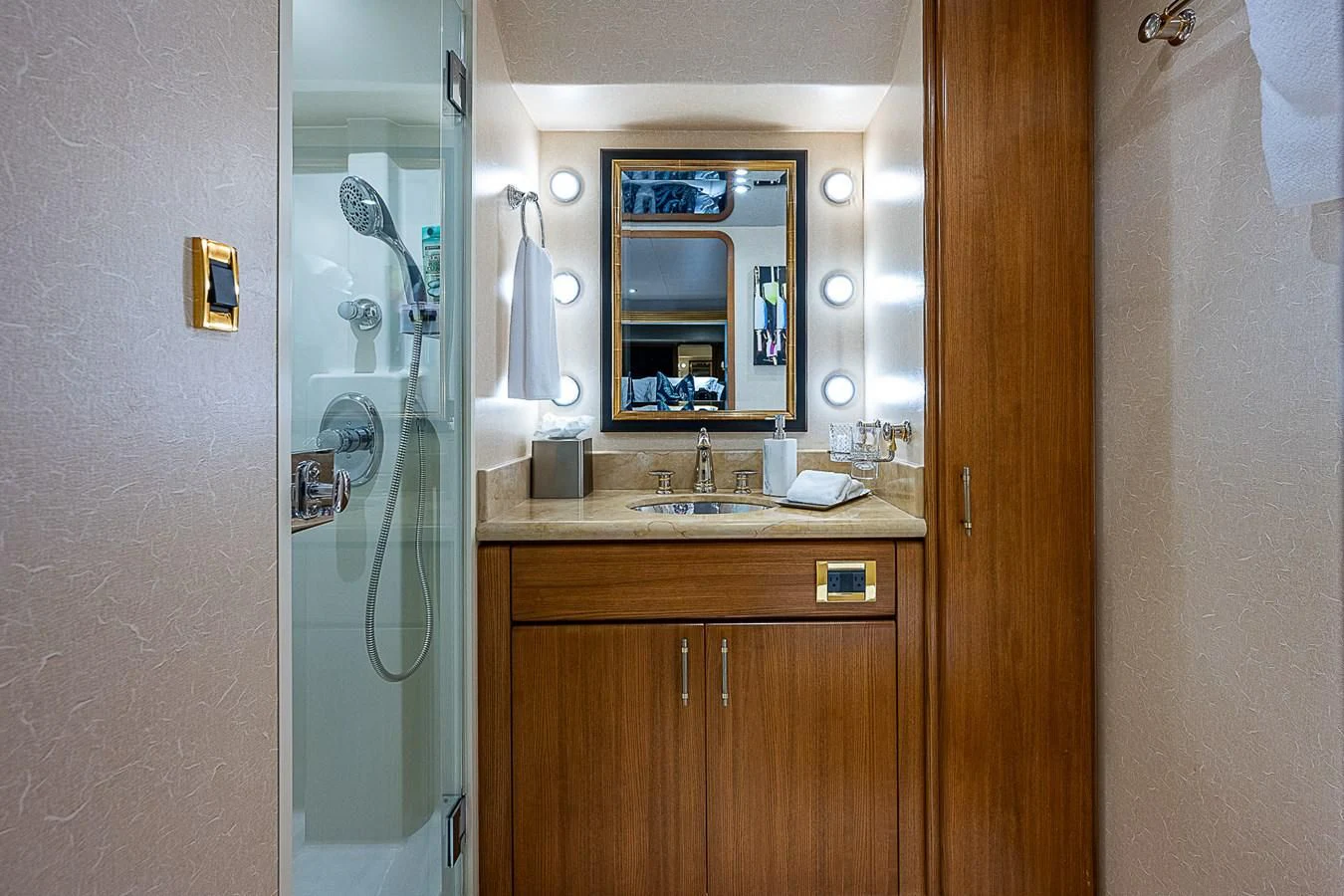 a bathroom with a sink and a mirror aboard SUPERSTAR Yacht for Charter