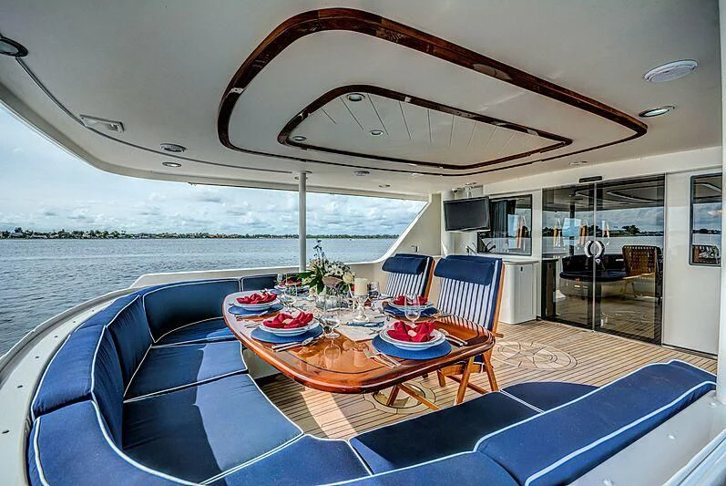 a large boat on the water aboard SUPERSTAR Yacht for Charter