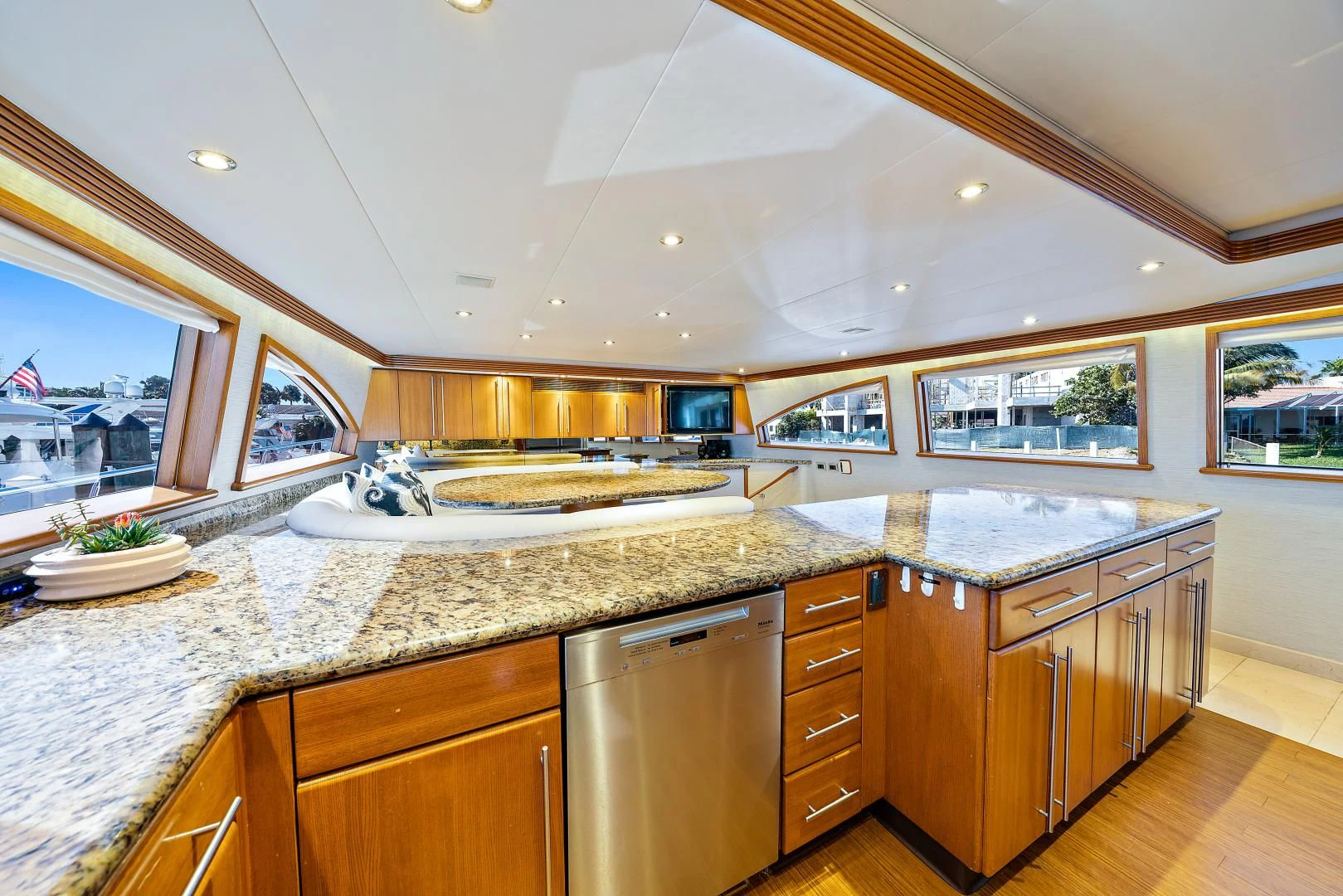 a large kitchen with marble counters aboard SUPERSTAR Yacht for Charter
