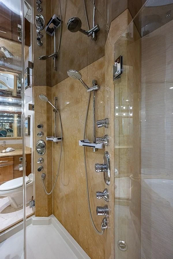 a bathroom with a shower aboard SUPERSTAR Yacht for Charter