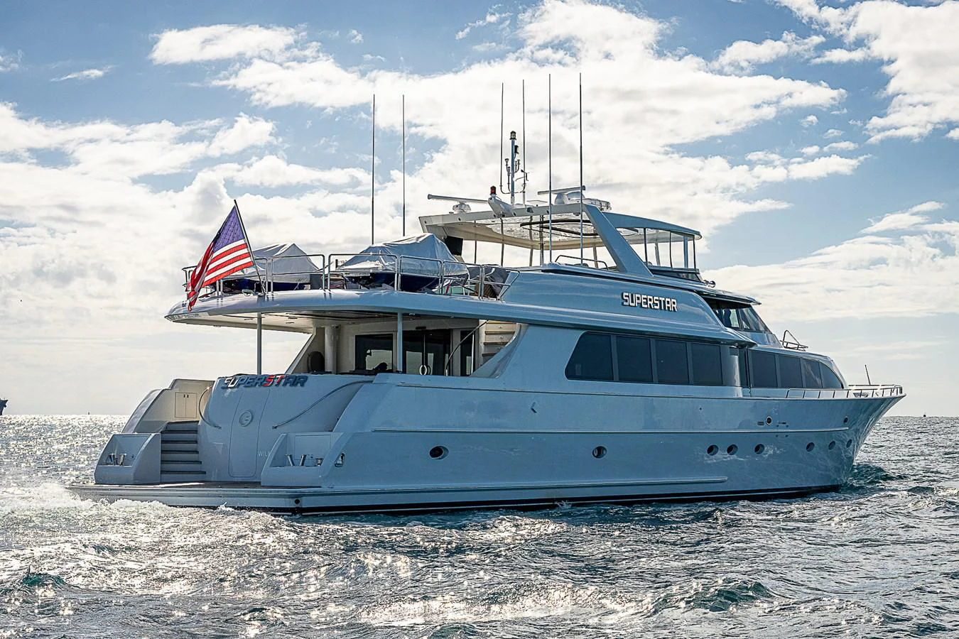 a boat on the beach aboard SUPERSTAR Yacht for Charter