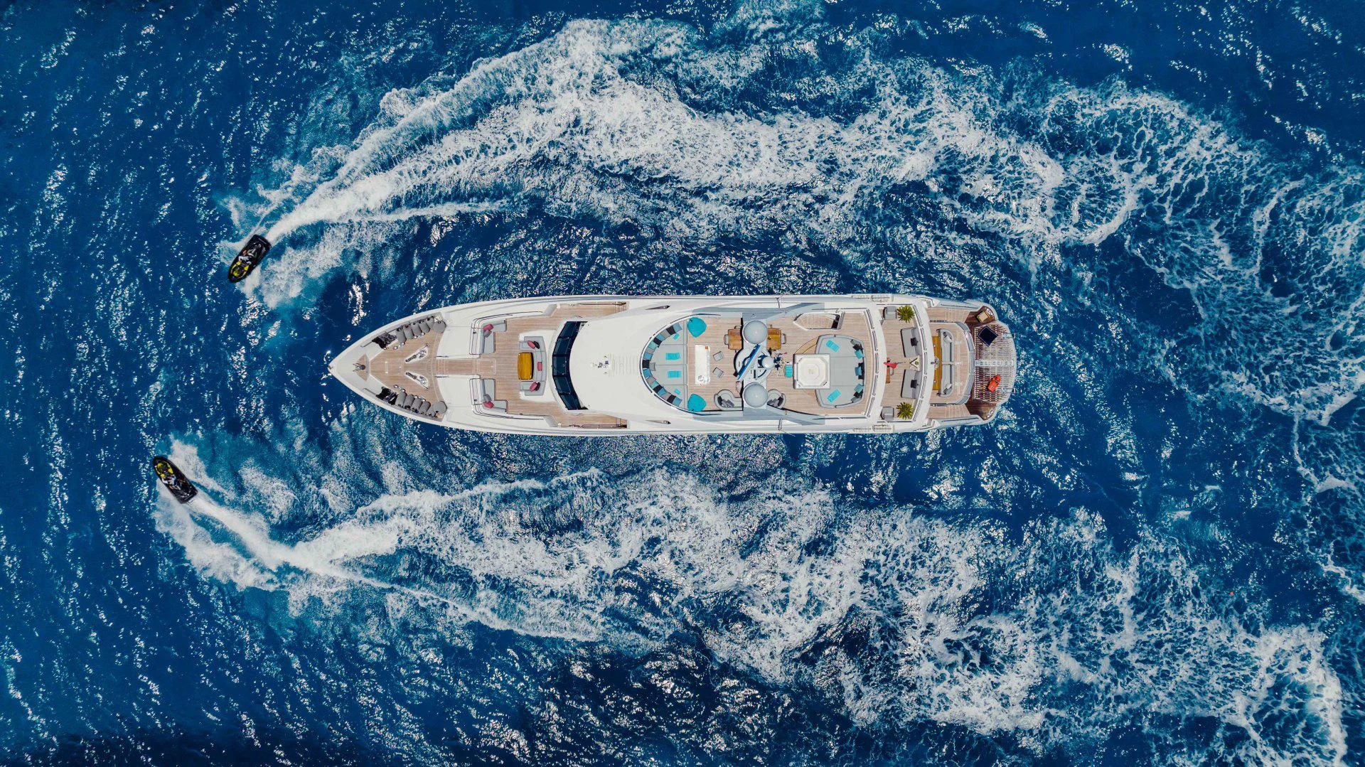 a white and black boat in the water aboard TAYRONA Yacht for Sale