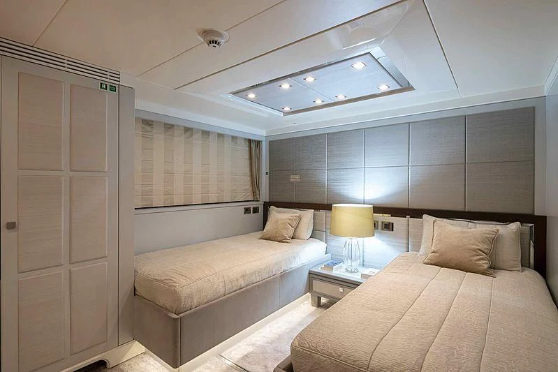 a room with two beds aboard TAYRONA Yacht for Sale