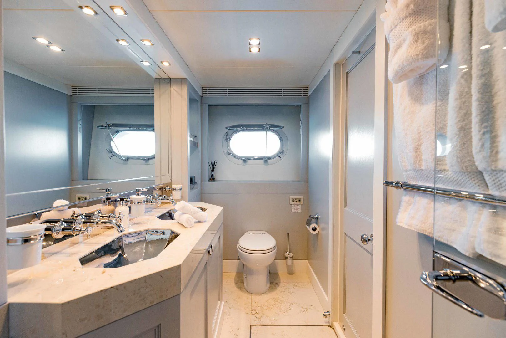 a bathroom with a sink and a toilet aboard TAYRONA Yacht for Sale