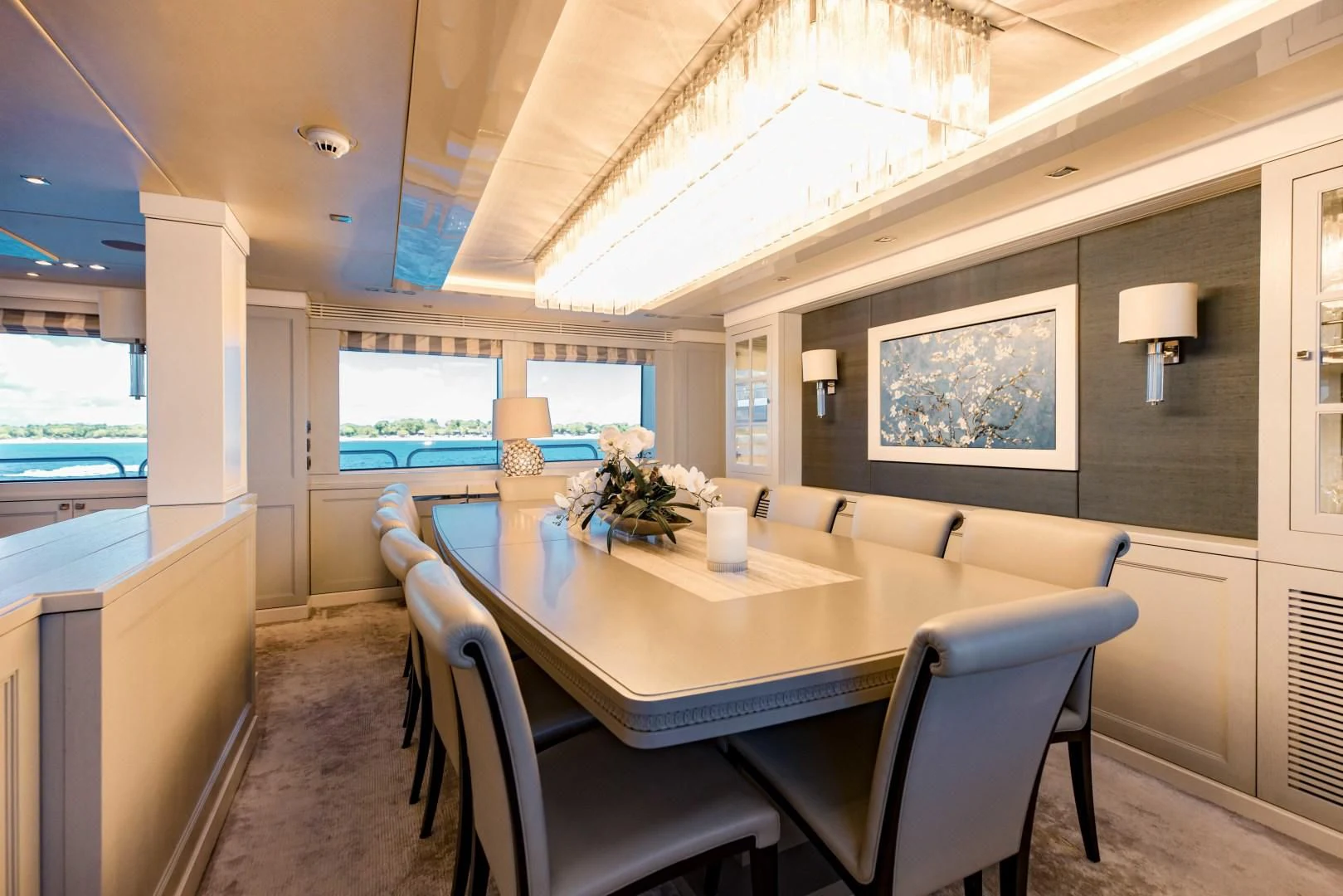 a dining table in a room aboard TAYRONA Yacht for Sale