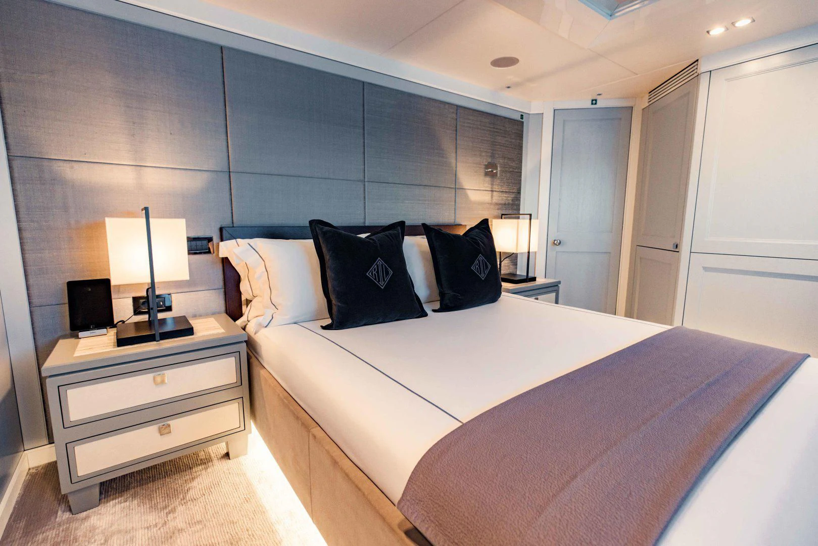 a hotel room with a bed aboard TAYRONA Yacht for Sale