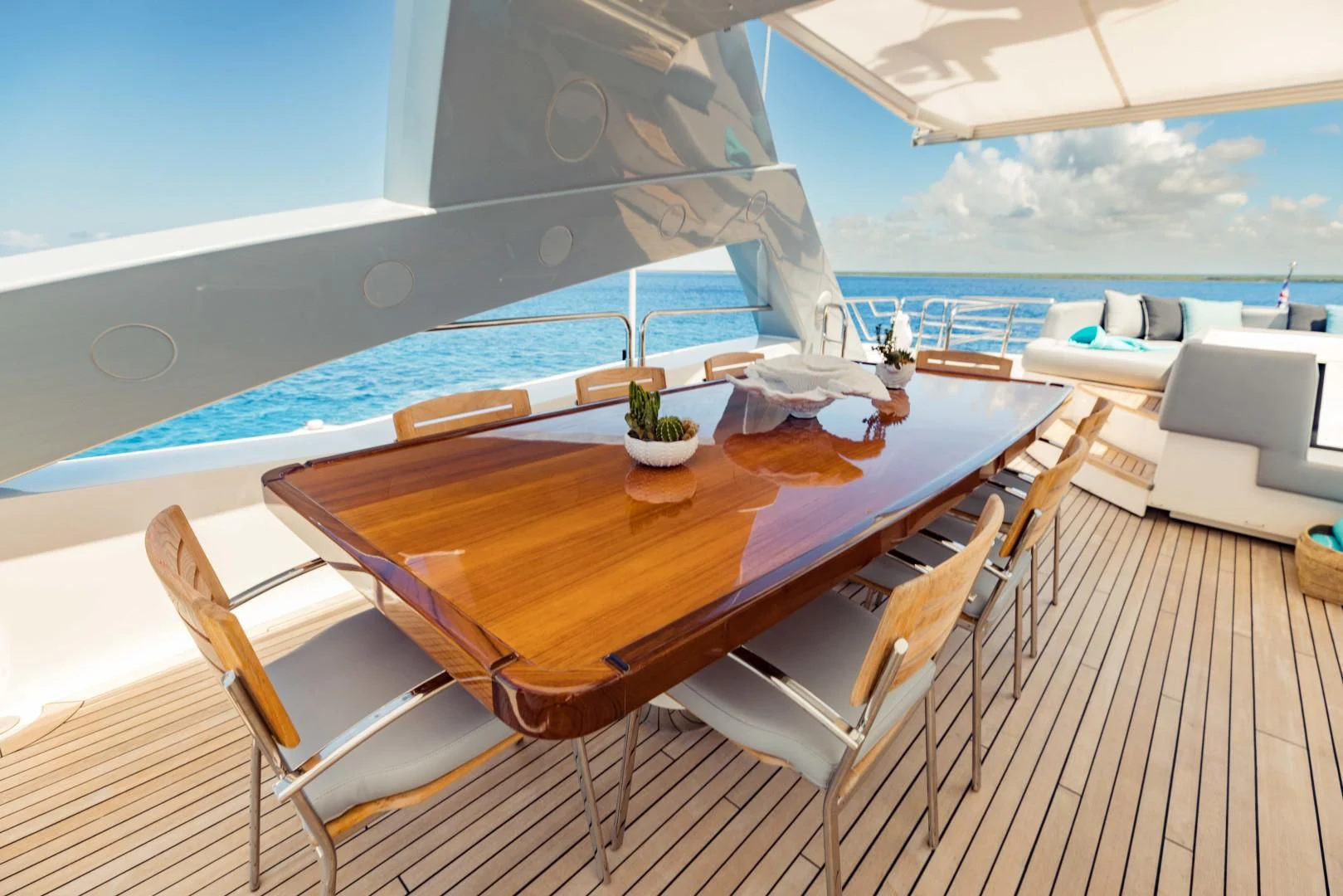 a table with chairs around it aboard TAYRONA Yacht for Sale