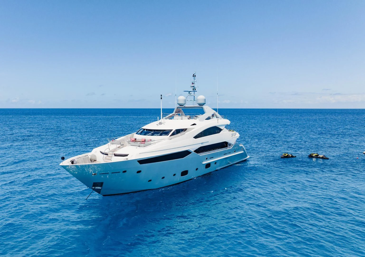 a white yacht in the water aboard TAYRONA Yacht for Sale