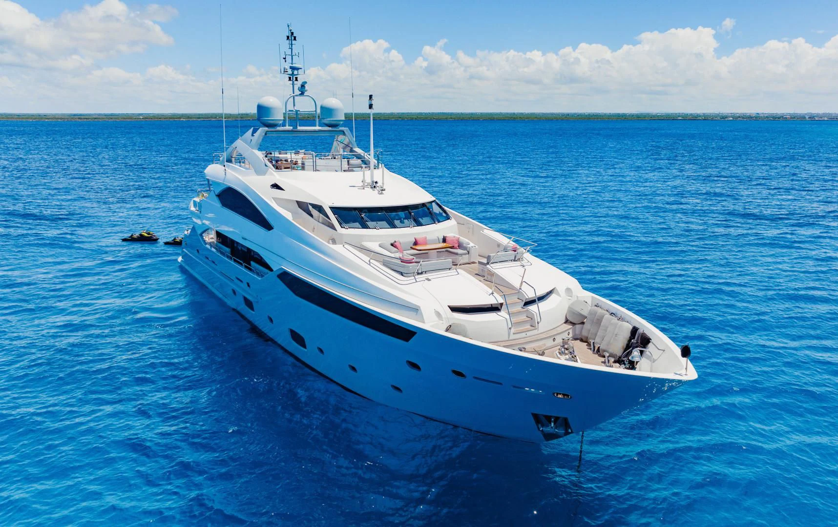 a white boat in the water aboard TAYRONA Yacht for Sale