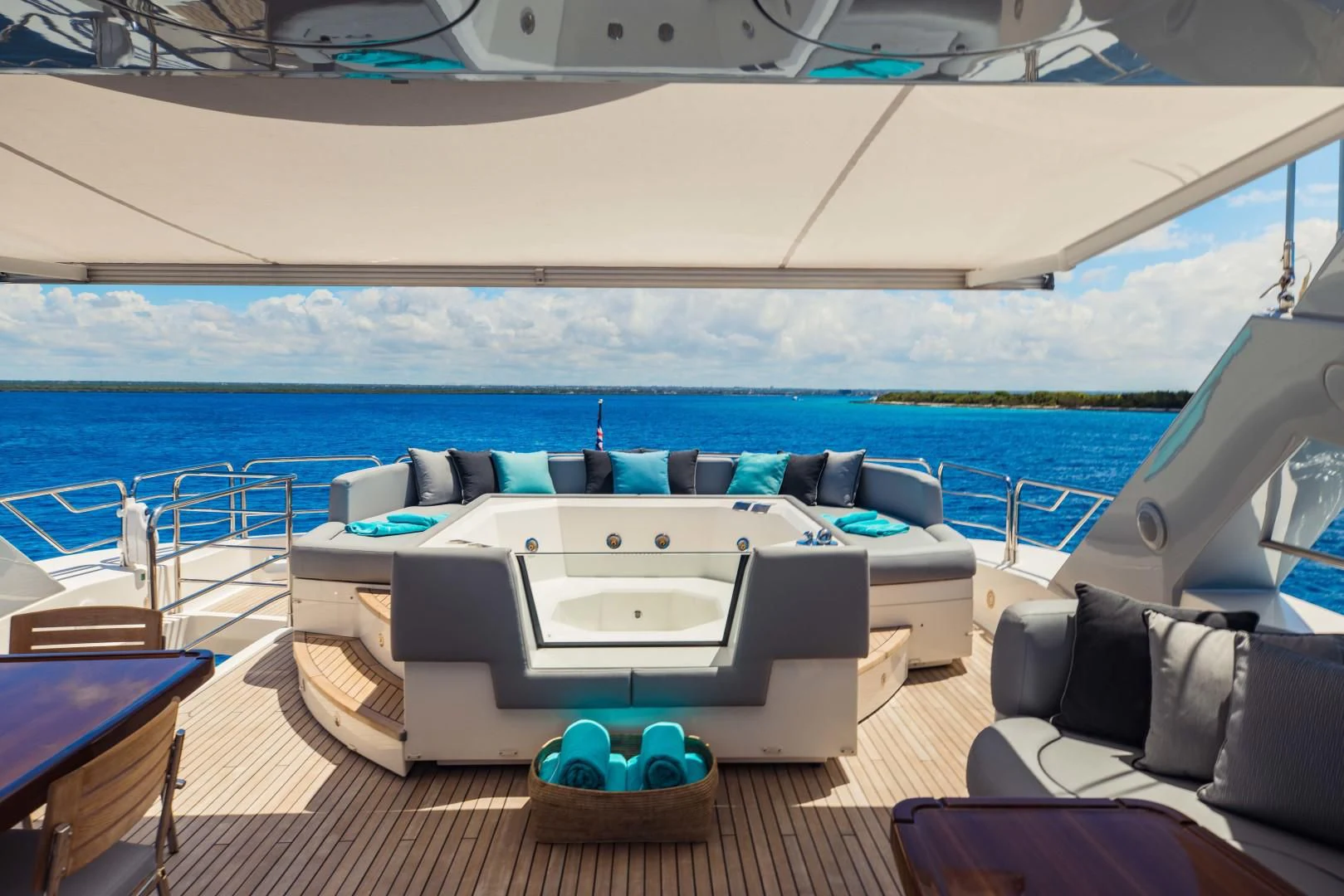 a large white lounge chair on a boat aboard TAYRONA Yacht for Sale