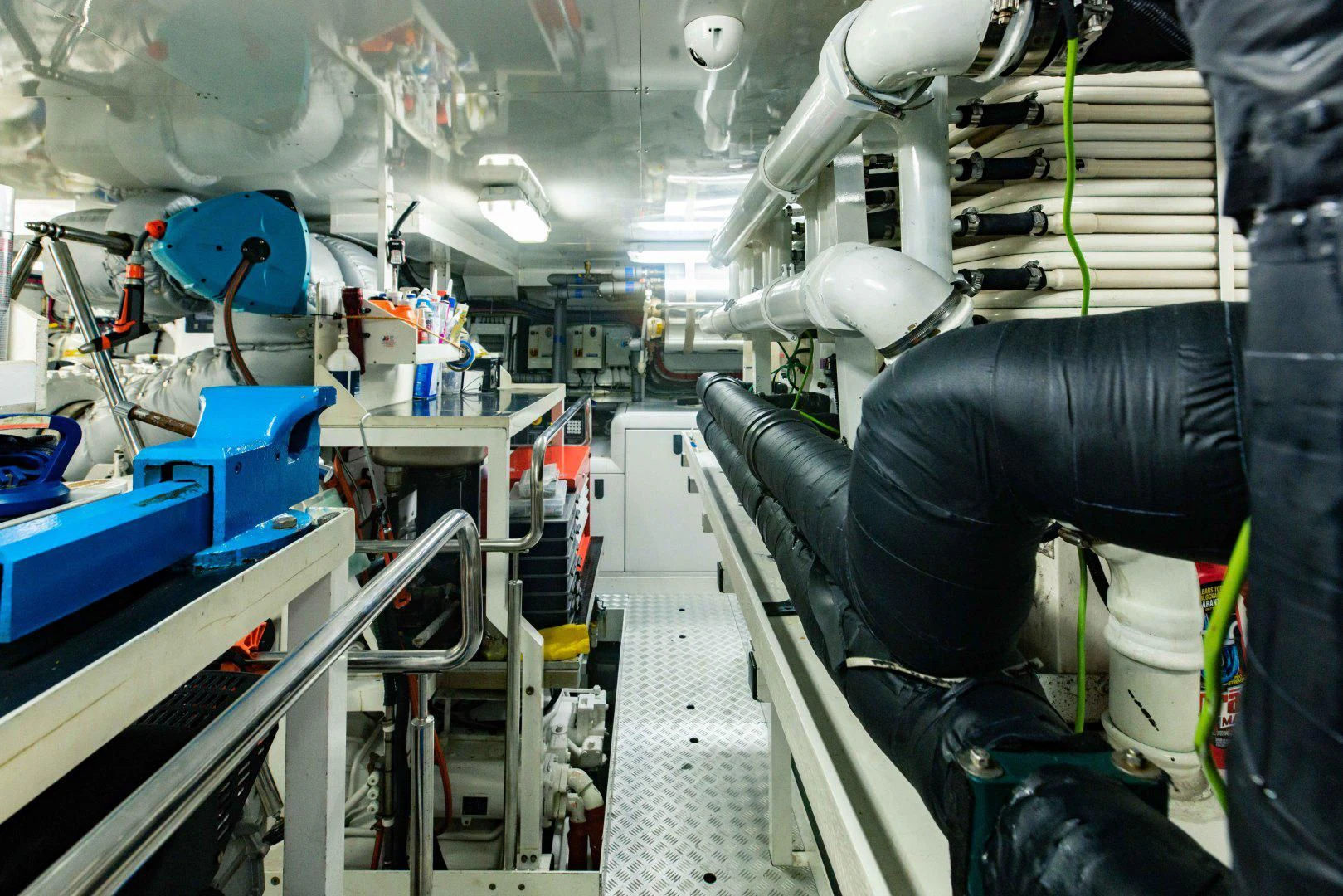 a room with a person in it aboard TAYRONA Yacht for Sale