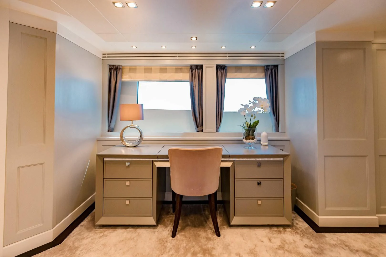 a kitchen with a desk and a chair aboard TAYRONA Yacht for Sale