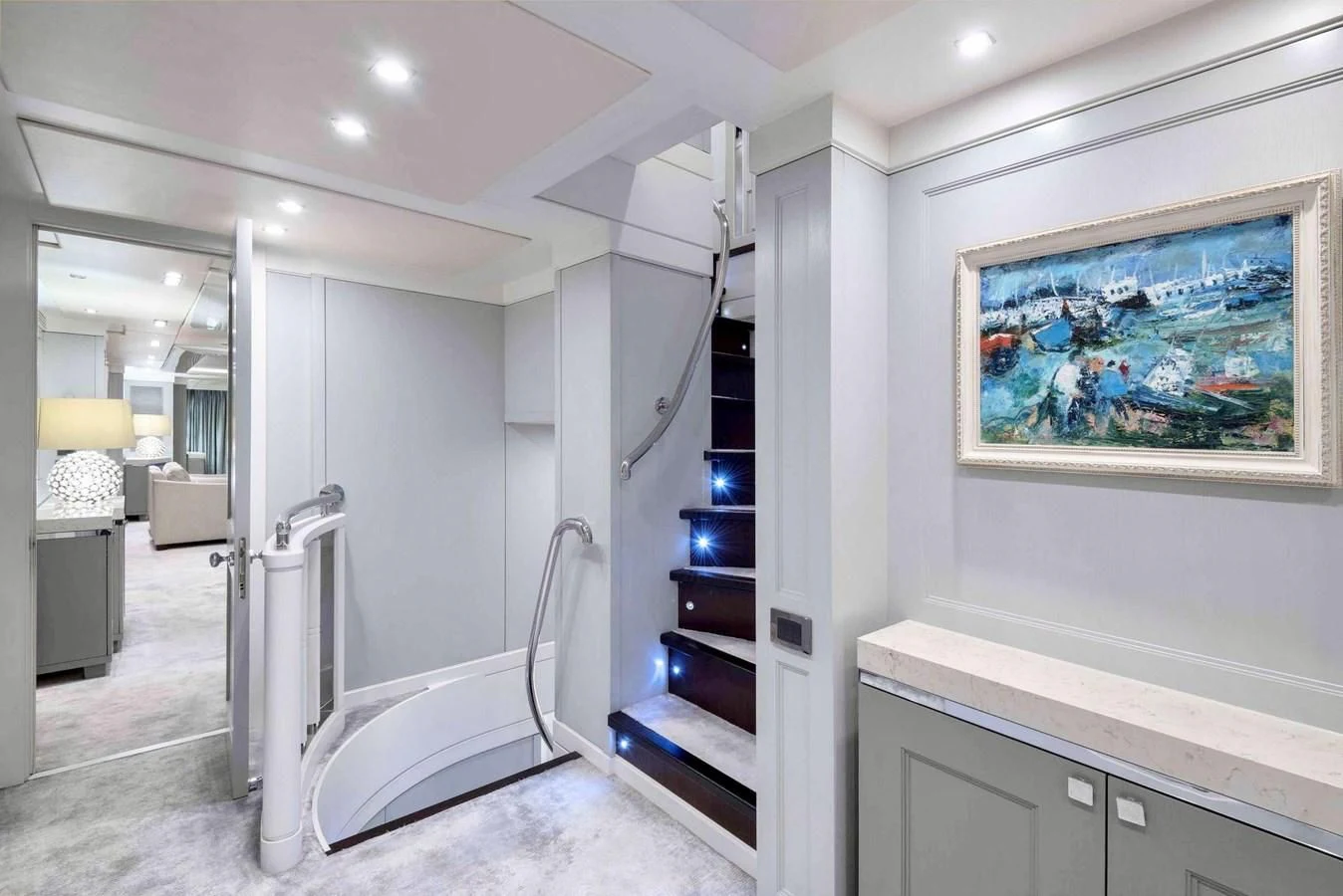 a white room with a ladder and a bookcase aboard TAYRONA Yacht for Sale