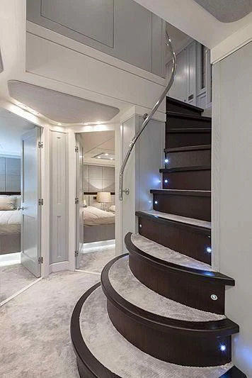 a staircase in a room aboard TAYRONA Yacht for Sale