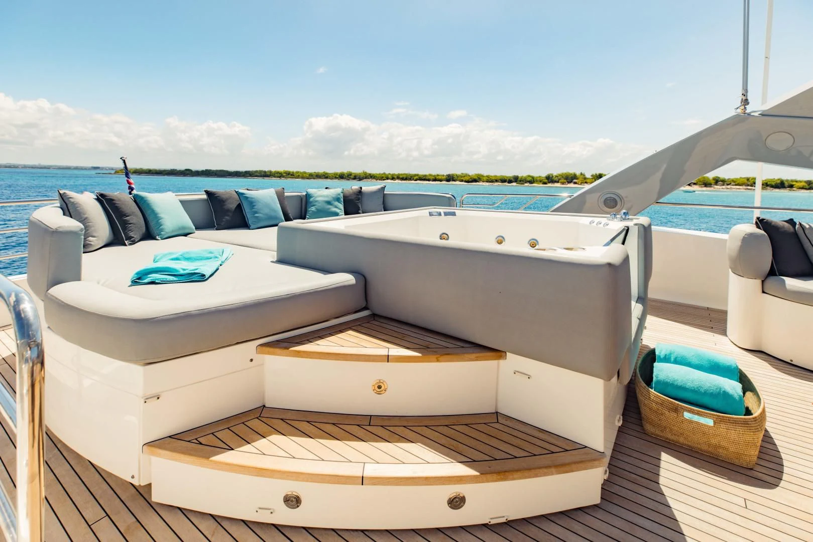 a bed with a white bed aboard TAYRONA Yacht for Sale