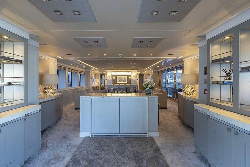 a large kitchen with a marble floor aboard TAYRONA Yacht for Sale