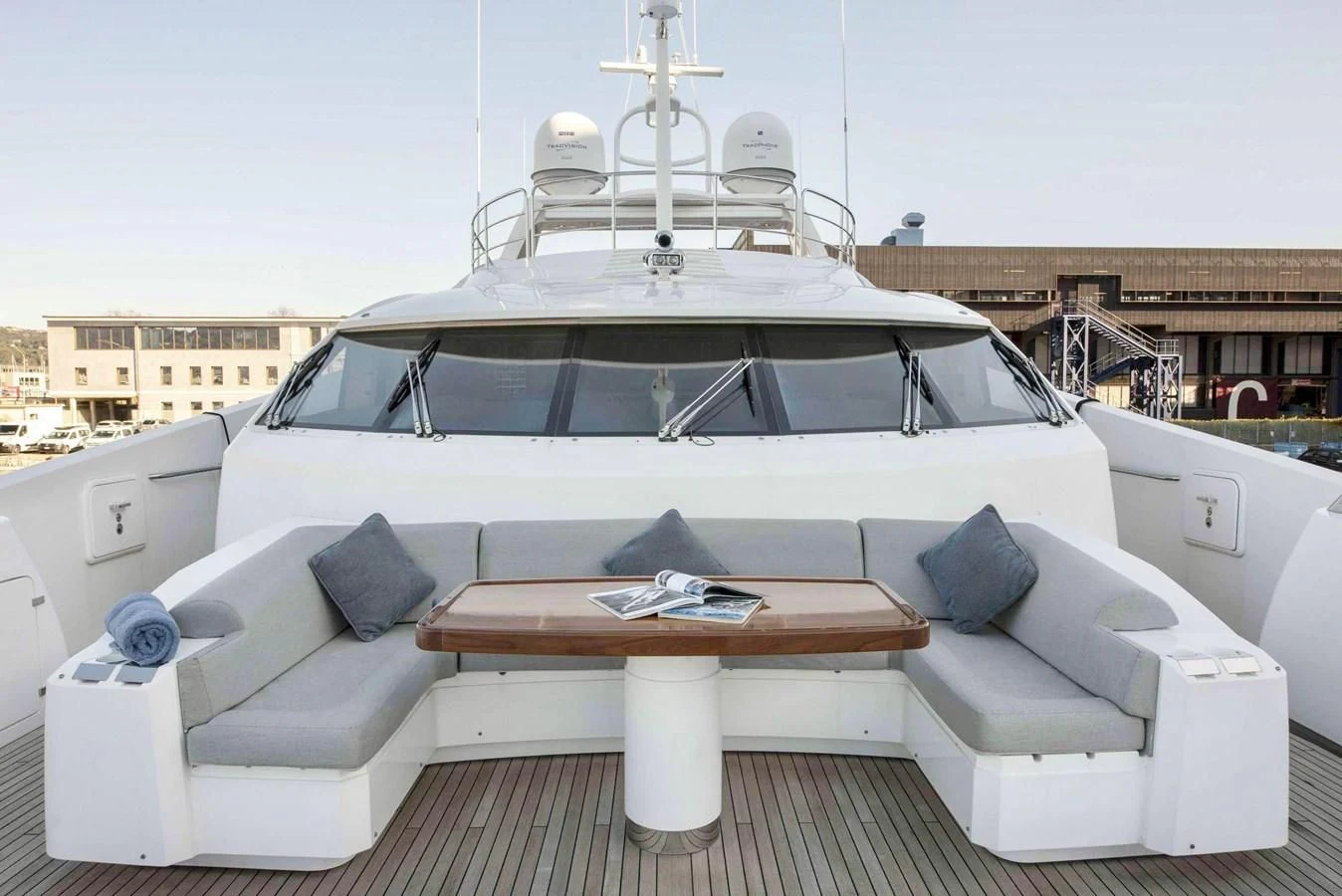 a white boat on a deck aboard TAYRONA Yacht for Sale