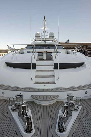 a white boat with a white deck aboard TAYRONA Yacht for Sale