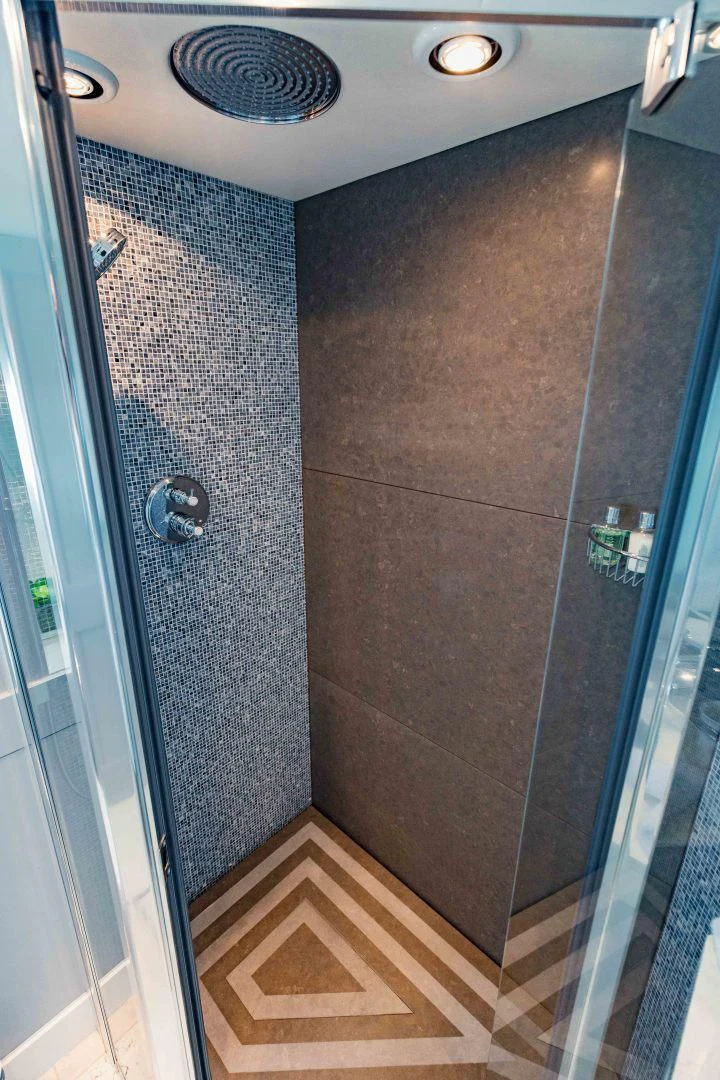 a tile floor with a vent aboard TAYRONA Yacht for Sale