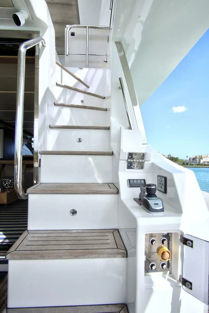 a white boat with a metal railing aboard GRATITUDE Yacht for Sale
