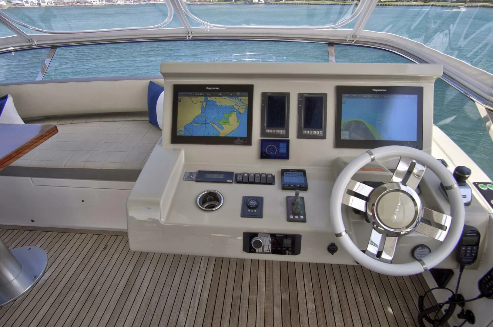 a white boat with a screen and buttons on it aboard GRATITUDE Yacht for Sale