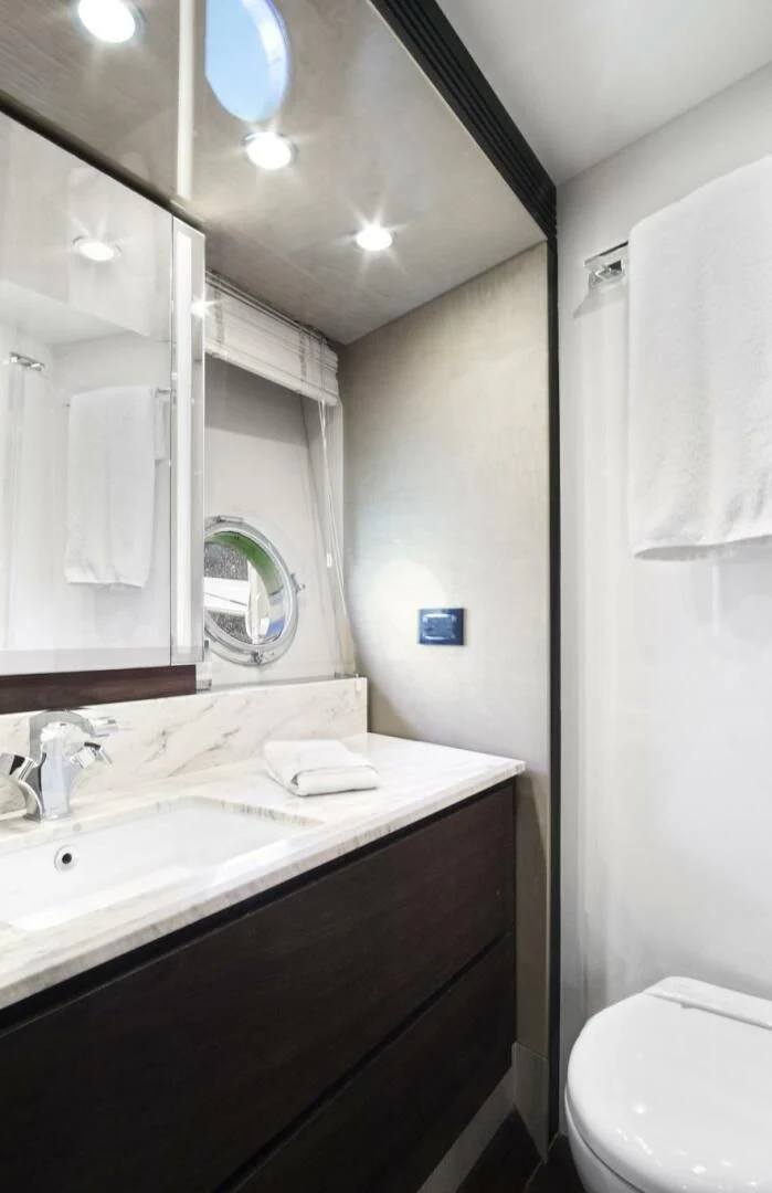 a bathroom with a sink and a toilet aboard GRATITUDE Yacht for Sale