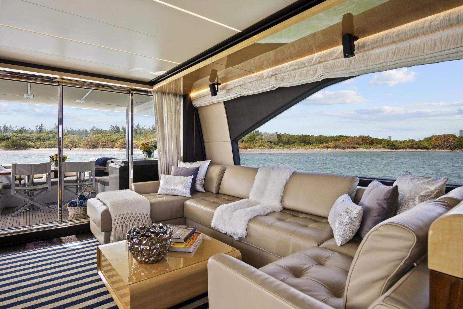 a living room with a large window aboard GRATITUDE Yacht for Sale