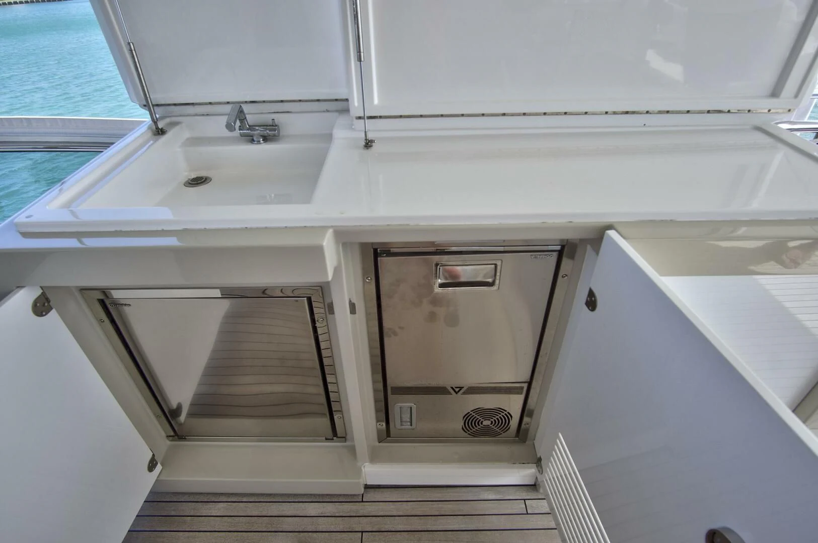 a white sink with a faucet aboard GRATITUDE Yacht for Sale