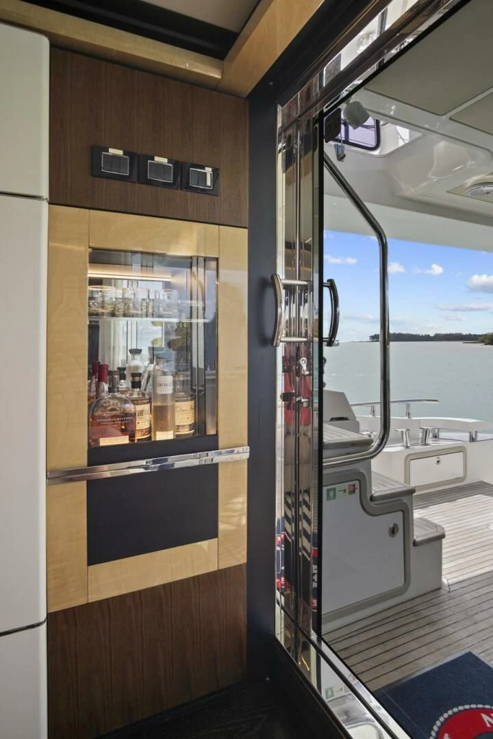 a door with glass doors aboard GRATITUDE Yacht for Sale