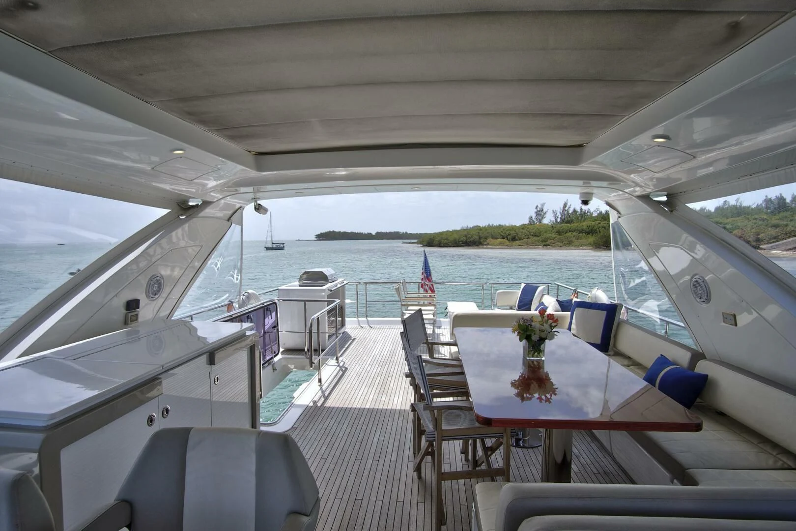 a boat with tables and chairs aboard GRATITUDE Yacht for Sale