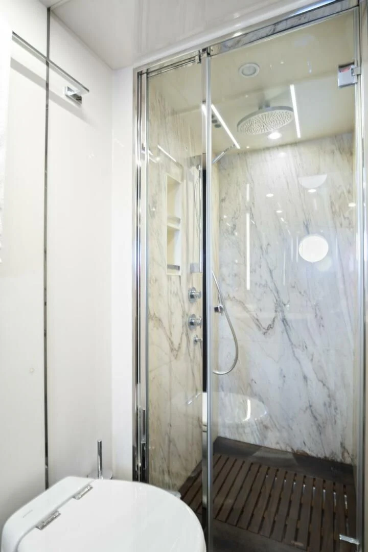a shower with a glass door aboard GRATITUDE Yacht for Sale