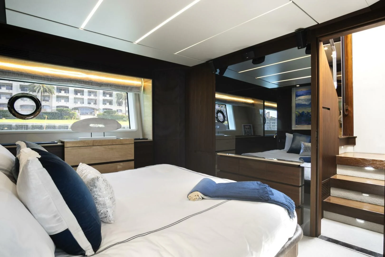 a room with a bed and a window aboard GRATITUDE Yacht for Sale