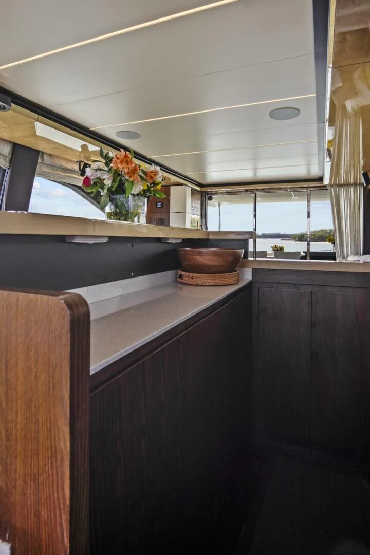 a kitchen with a window aboard GRATITUDE Yacht for Sale