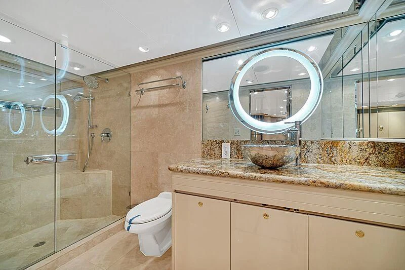a bathroom with a glass shower aboard MAVERICK Yacht for Charter