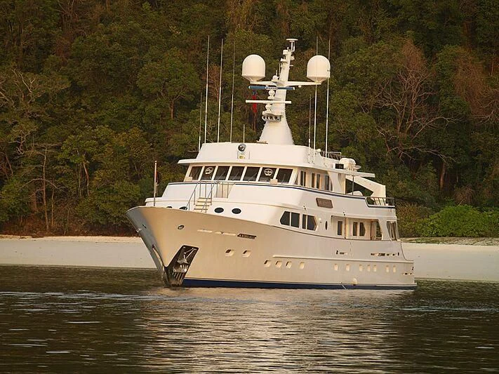 a large white boat on the water aboard MAVERICK Yacht for Charter
