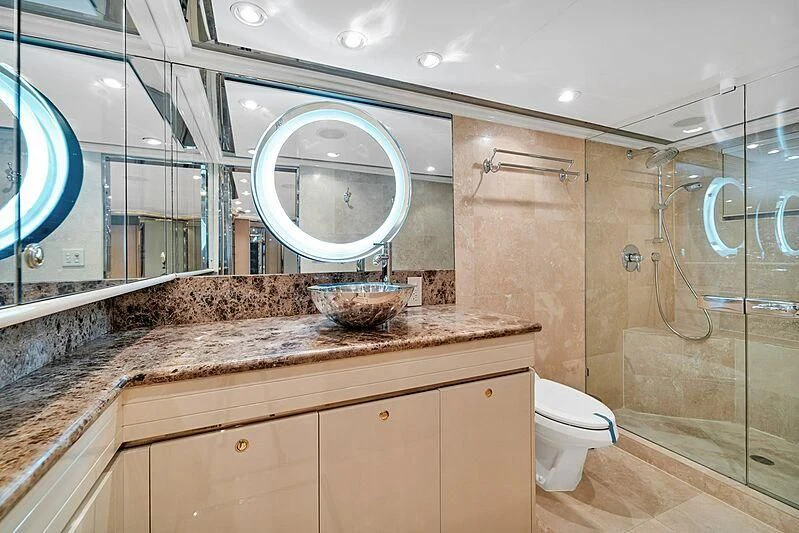 a bathroom with marble counter tops aboard MAVERICK Yacht for Charter