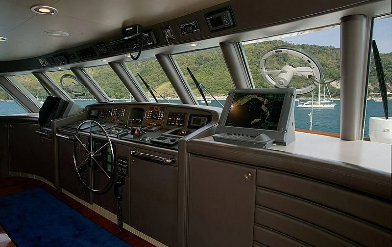 a vehicle with a laptop on the counter aboard MAVERICK Yacht for Charter