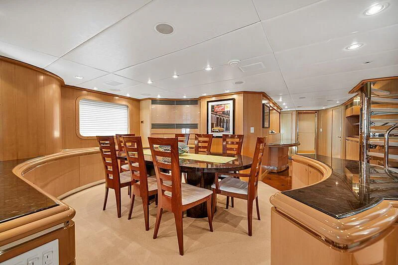 a kitchen and dining area aboard MAVERICK Yacht for Charter